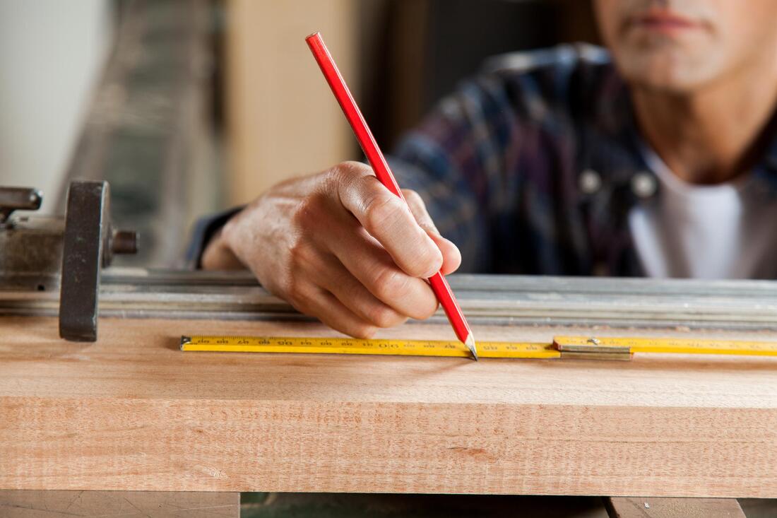 worker using a pencil
